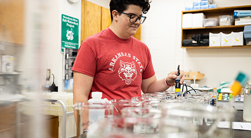 A student doing a science experiment