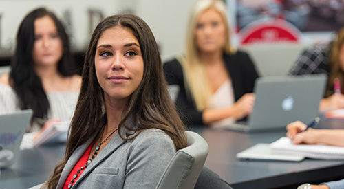 A student watching a sales pitch